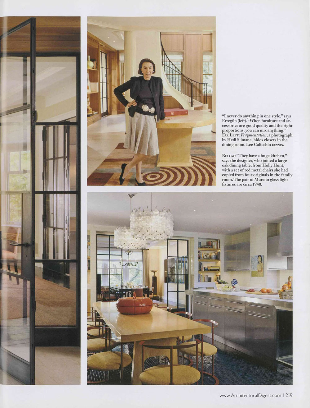 Magazine page featuring CNR Group luxury home builders project interior scene: Woman standing in a stylish room with a spiral staircase and round table, next to a modern kitchen with a large oak dining table, red metal chairs, and two glass chandeliers.