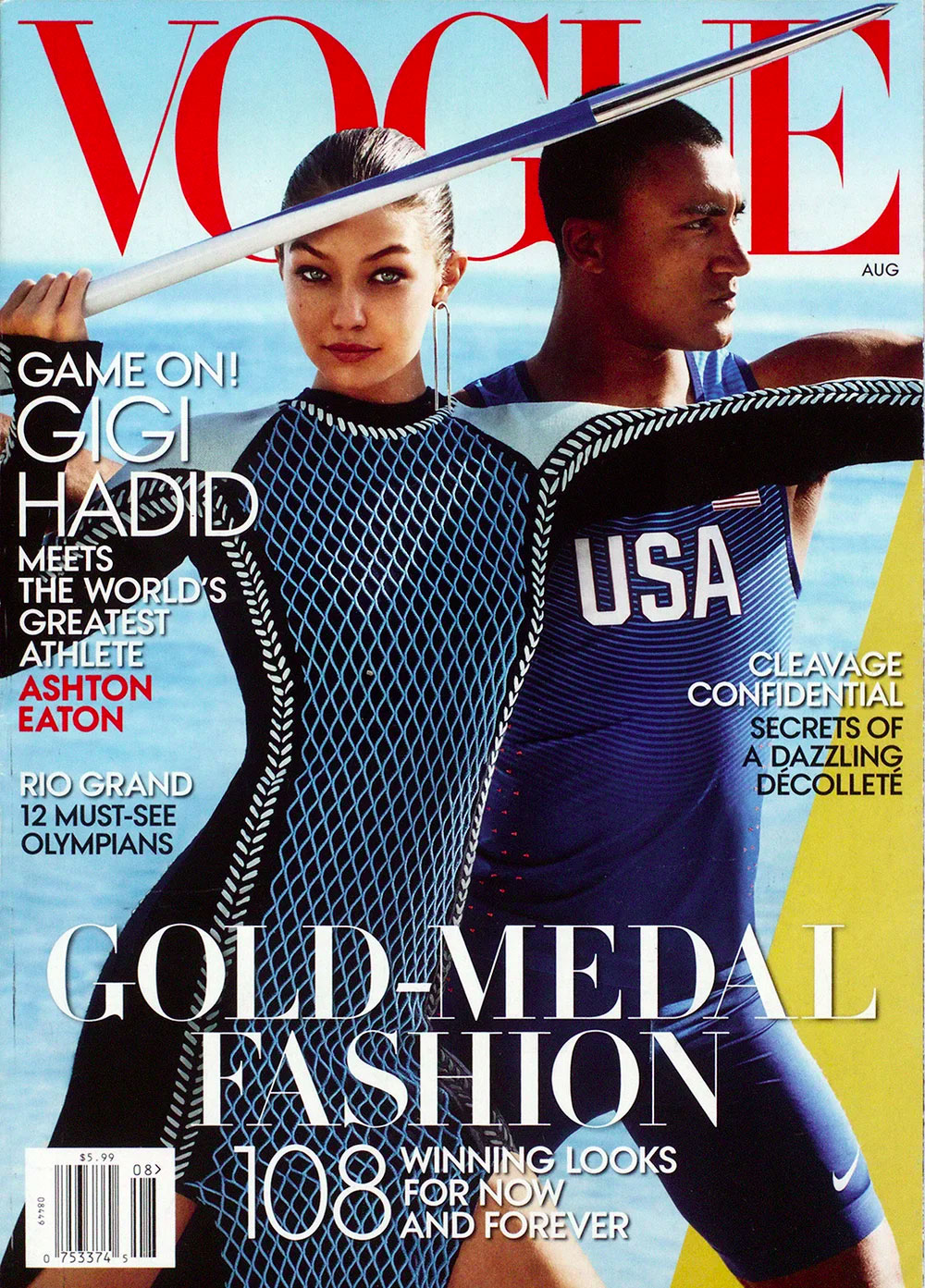 Vogue magazine issue that includes CNR Group luxury home building. The cover features Gigi Hadid holding a spear next to Olympian Ashton Eaton wearing a USA uniform with ocean background.