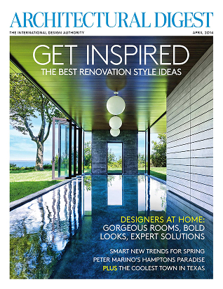 Architectural Digest magazine cover of an issue that features a CNR luxury home build. The cover shows a reflective indoor pool, large windows, and spherical ceiling lights.