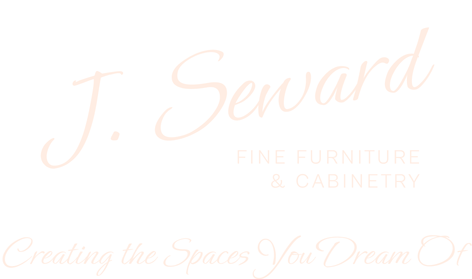 A white brand logo that reads J. Seward Fine Furniture & Cabinetry, Creating the Spaces You Dream Of.