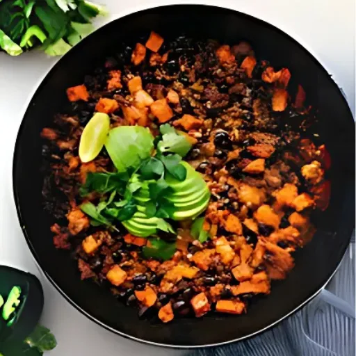 A bowl of sweet potato, ground turkey, green beans.