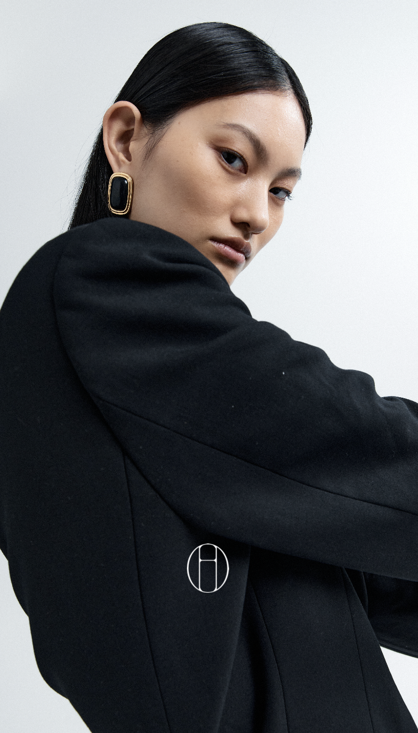 Brand icon over fashion image
