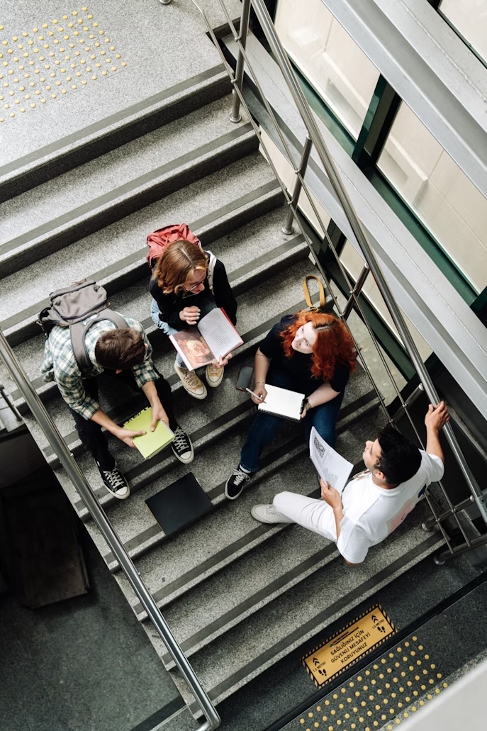 students hanging out on the stairs