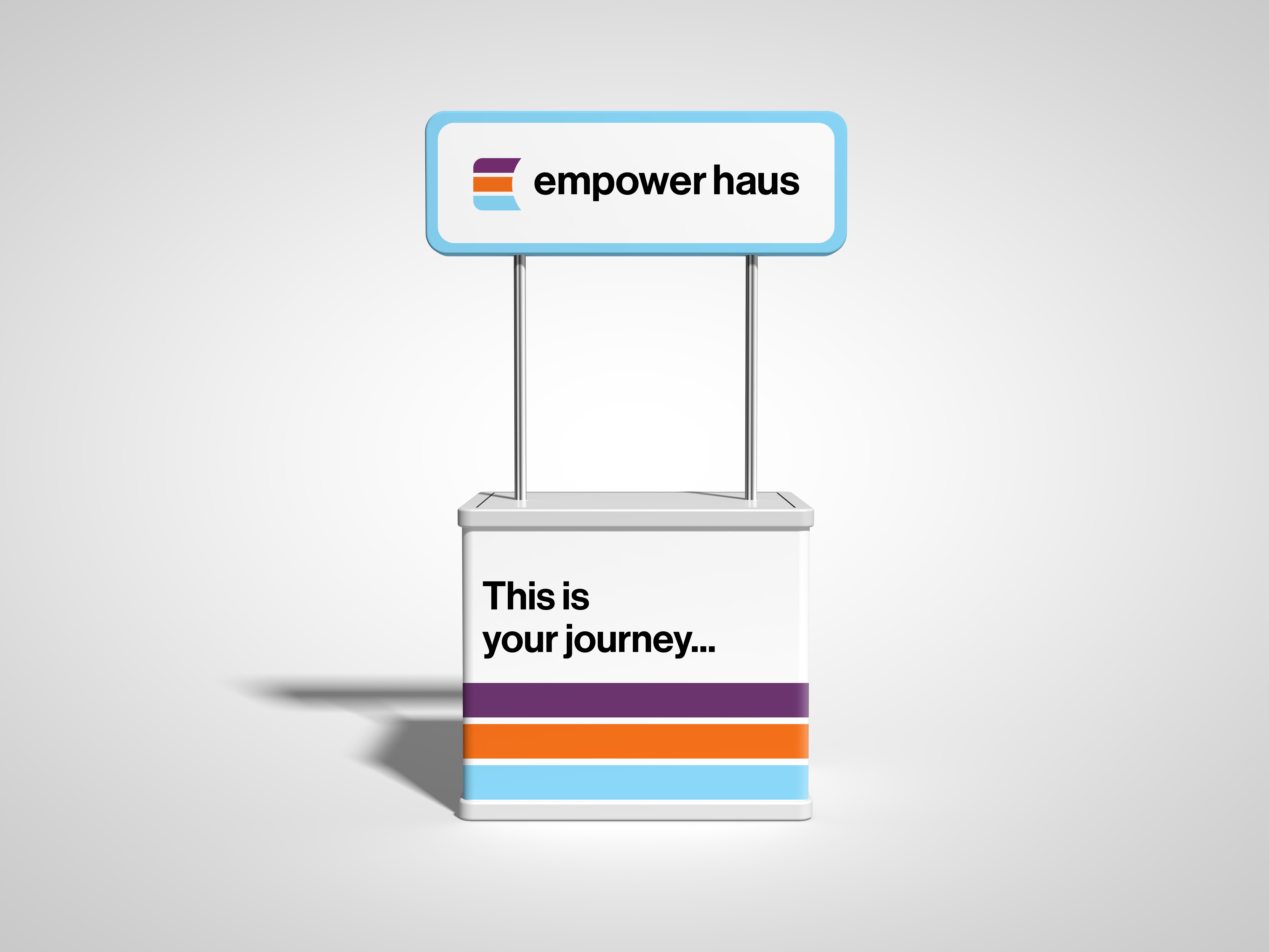 booth with "Empower Haus" logo and headline reading, "This is your journey..."