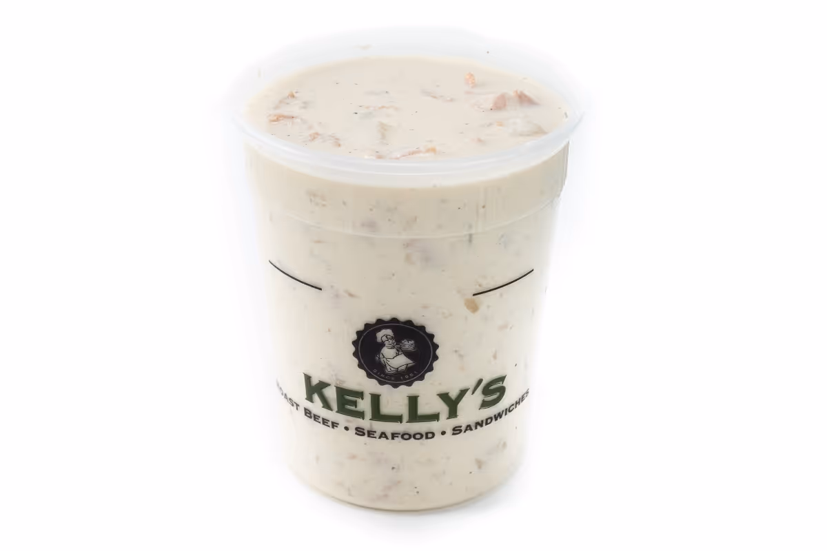 Clear plastic container filled with creamy clam chowder soup from Kelly's.
