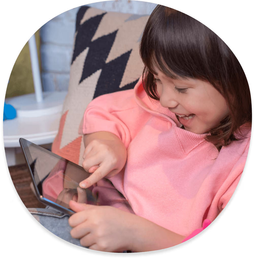 Kid playing with a tablet
