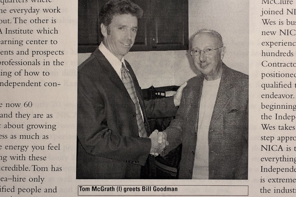 Tom McGrath meets Bill Goodman shake hands in the NICA offices way back when.