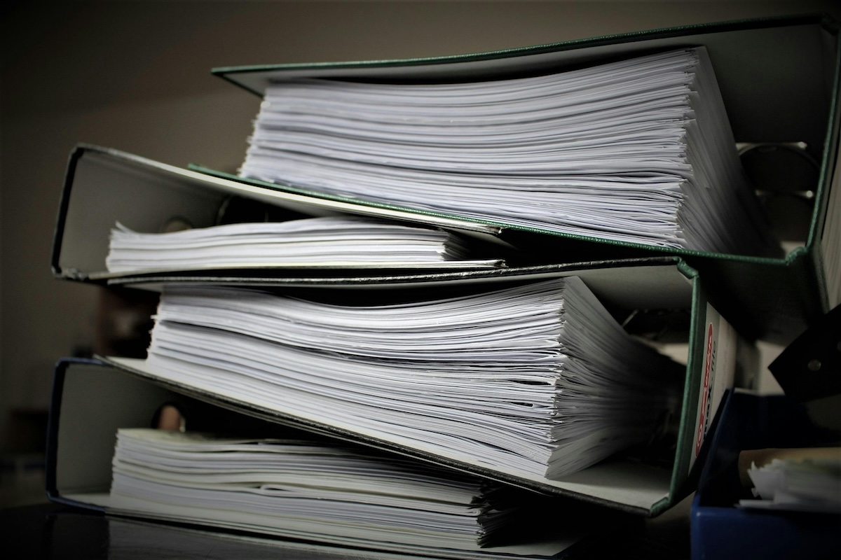 Stack of binders in an office.
