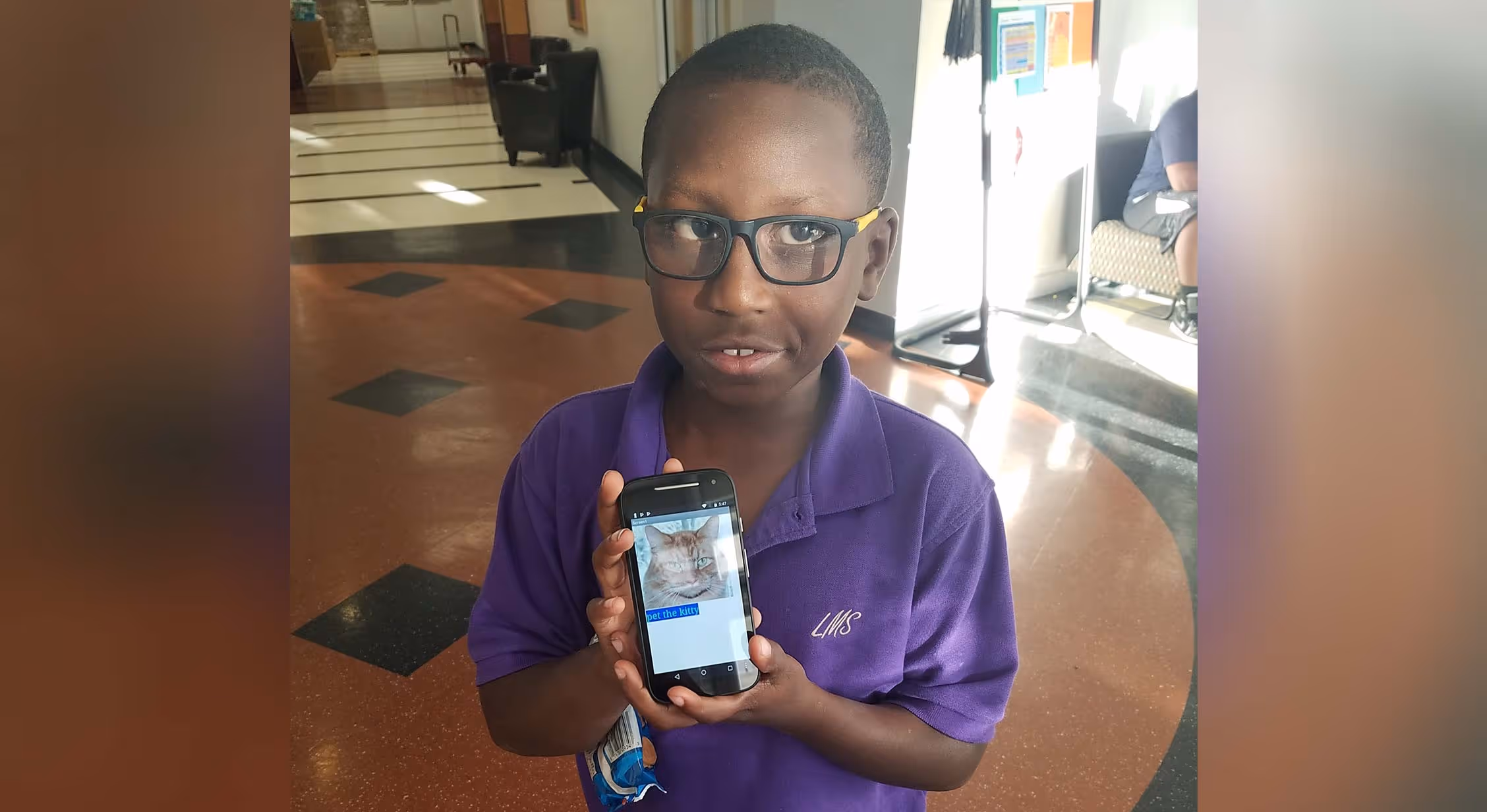 Justin, a boy enrolled in the Summer Brain Gain program.
