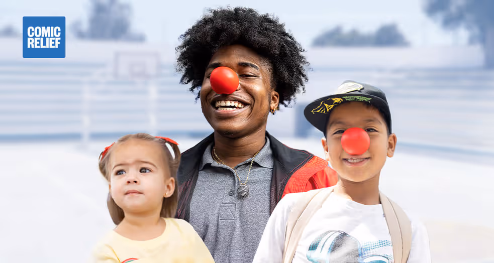Three students of varying ages are displayed, two are smiling and wearing red clown noses. The Comic Relief logo is in the top left of the image.