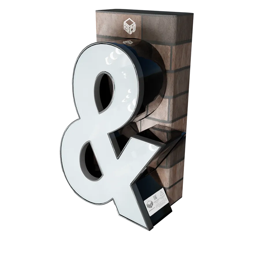 Modelo 3D de letra de canal (forma) "&" elaborada con el método "Trim Cap" apoyada sobre pared de ladrillo