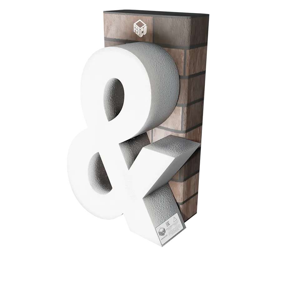 Modelo 3D de letra de canal (forma) "&" elaborada con el método "Corte de XPS" apoyada sobre pared de ladrillo