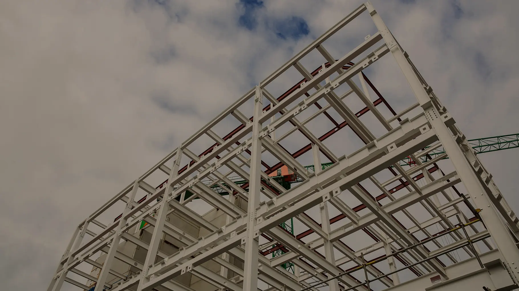 Steel structural frame representing tailored AEC services across architecture, engineering, BIM, and automation