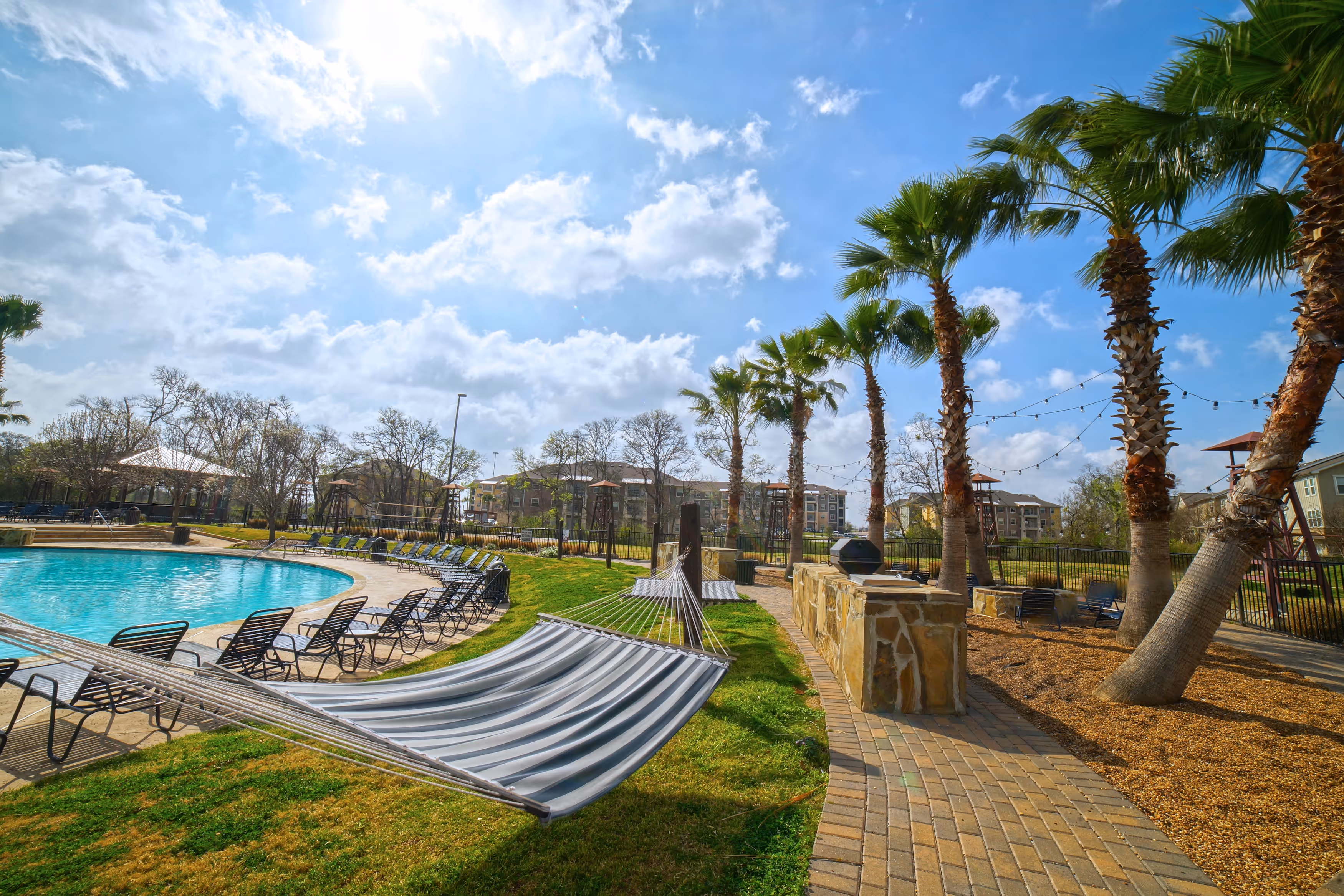 Outdoor grill to hammock to pool