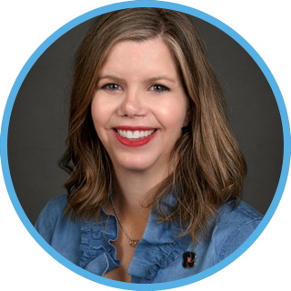 shelby cherry's headshot. friendly middle aged woman with a big smile
