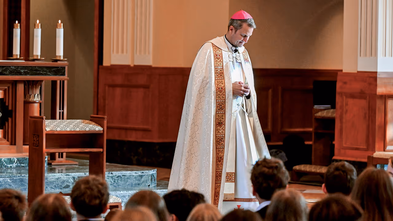 Bishop Hicks leading prayer