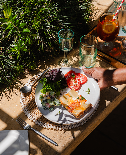Outdoor candlelit dinner overlooking the savannah.