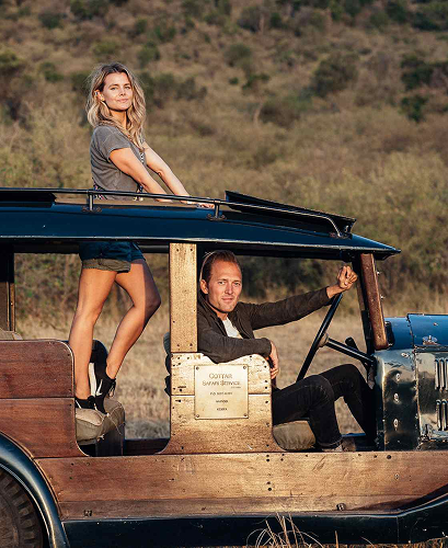 In-house photographer taking portraits of guests on safari.