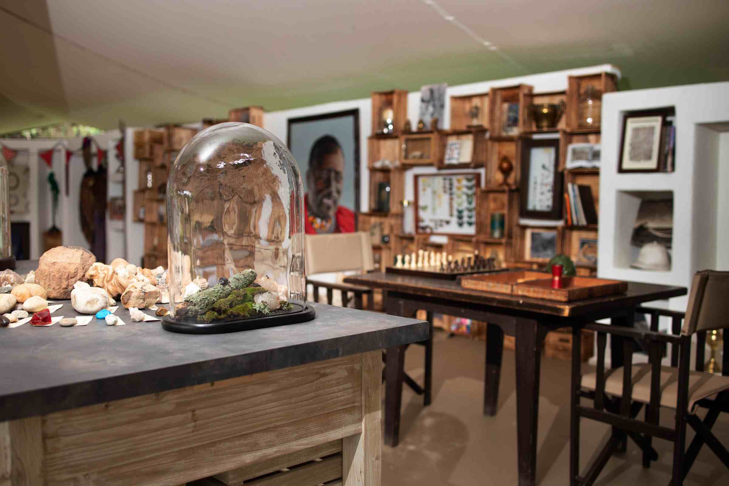 Explorer’s Tent The Explorer’s Tent at Cottar’s 1920s Camp displaying safari curiosities, books, and natural artifacts for guests to explore and learn.