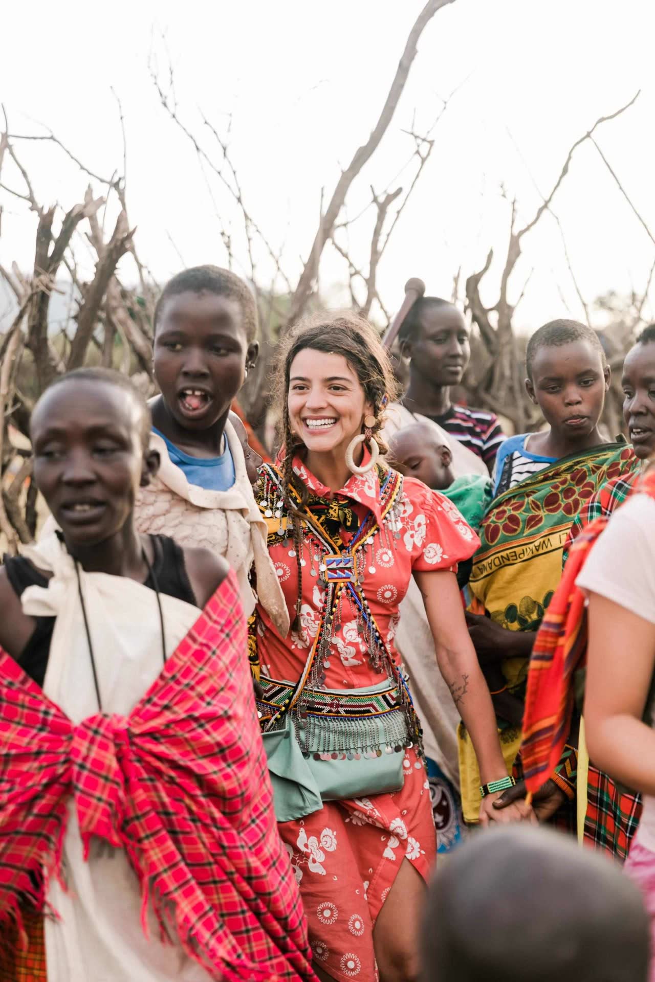 Maasai community members outside traditional manyattas.