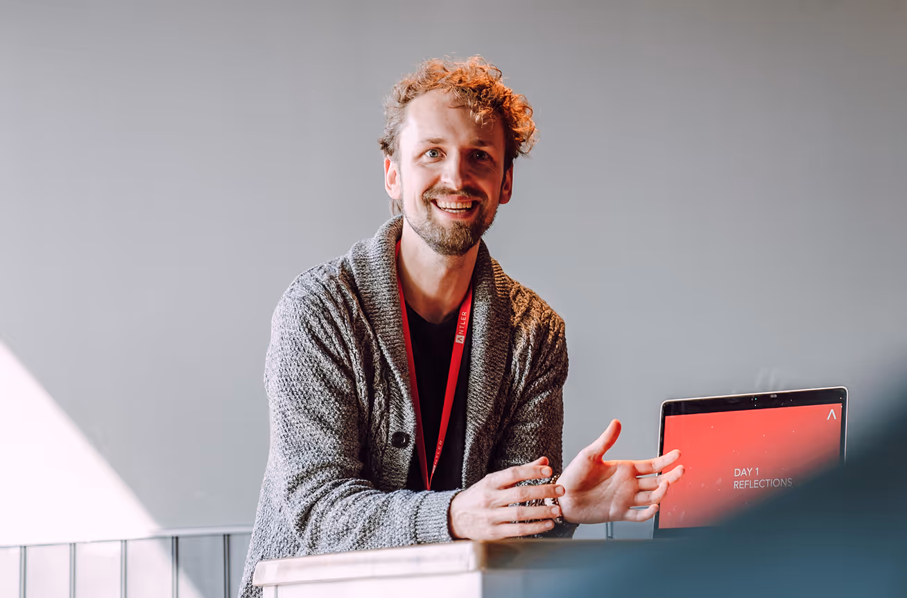 antler founder smiling and presenting