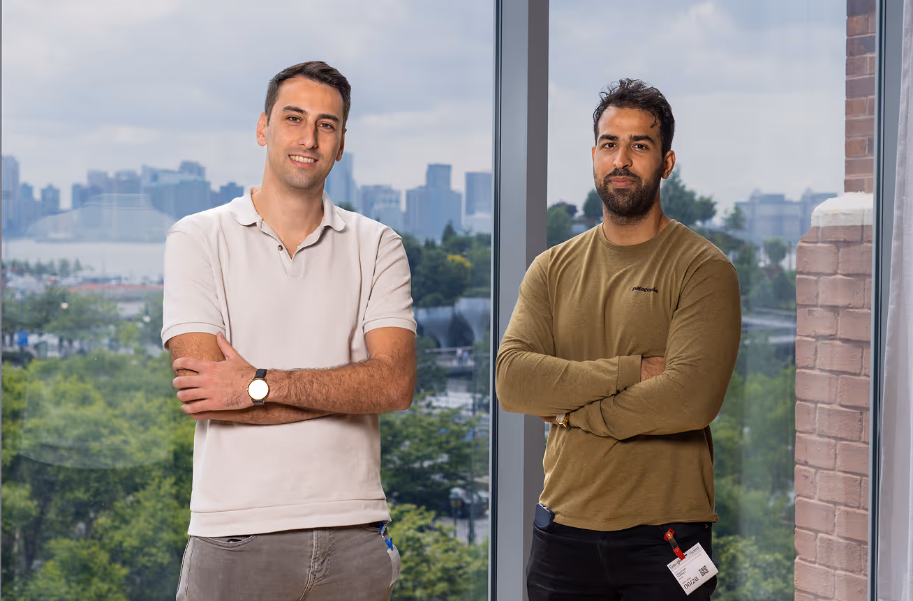 antler cofounders standing in front of window