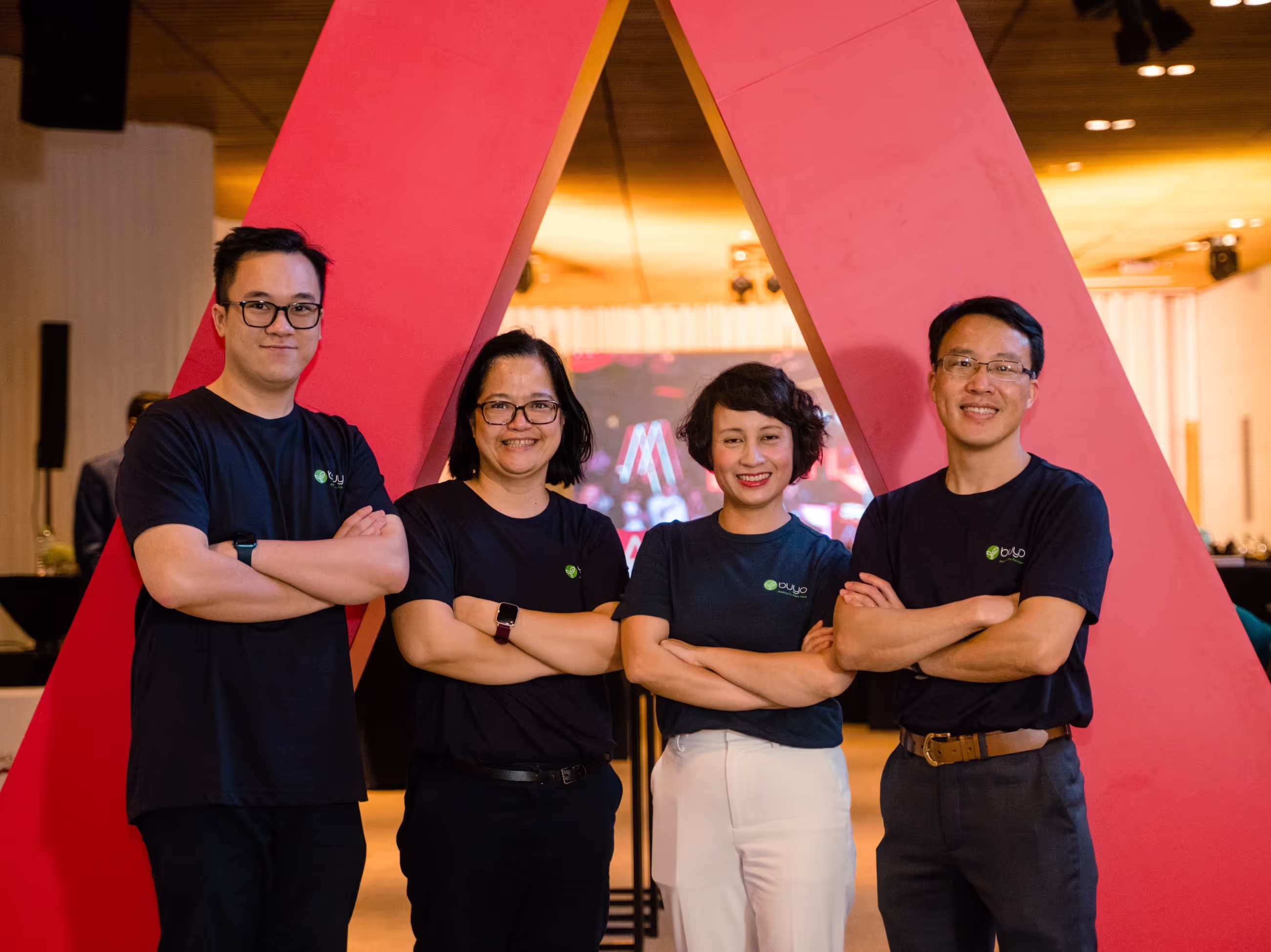 Founding team standing in front of big Antler 'A'