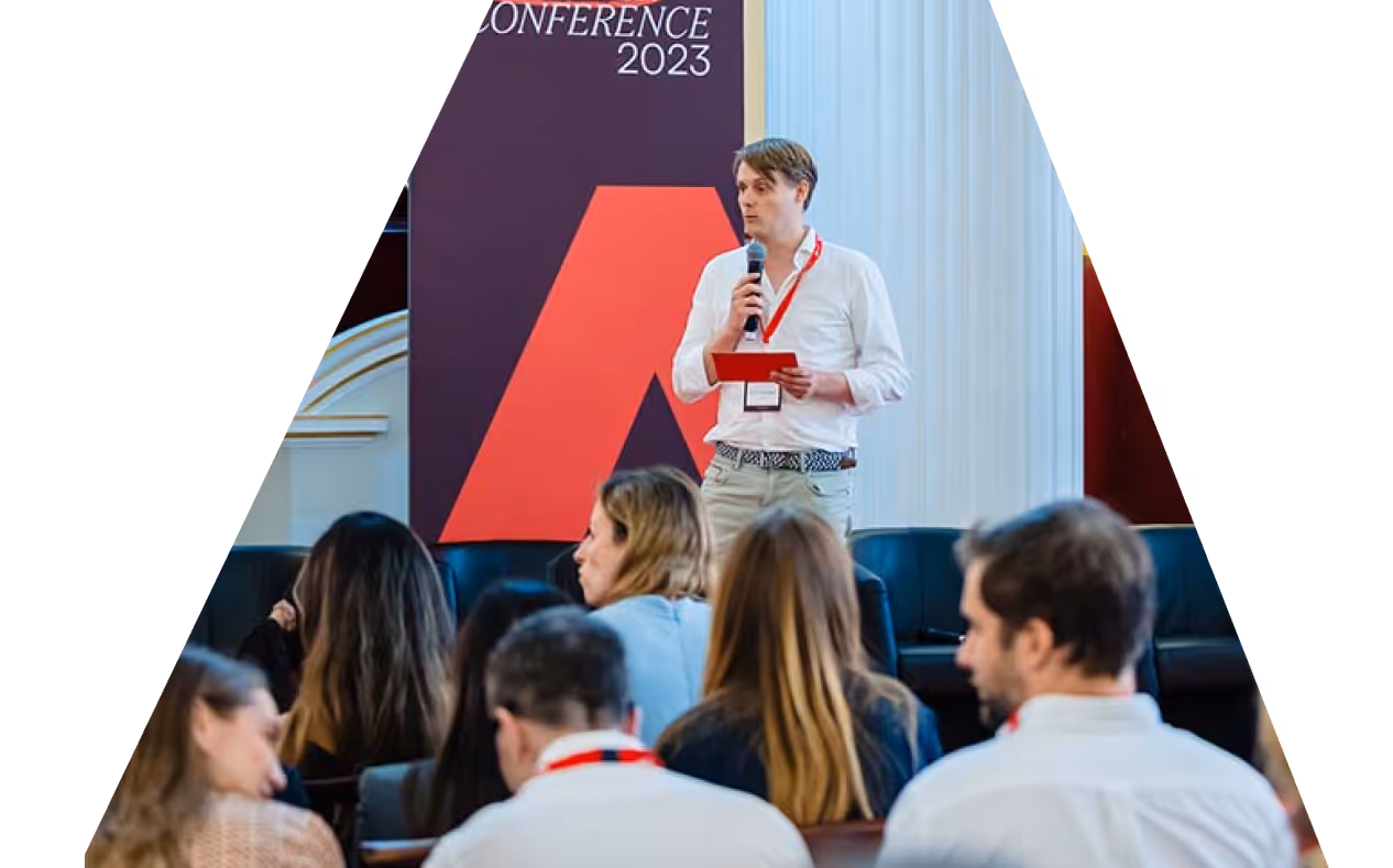 Antler partner pitching at an event