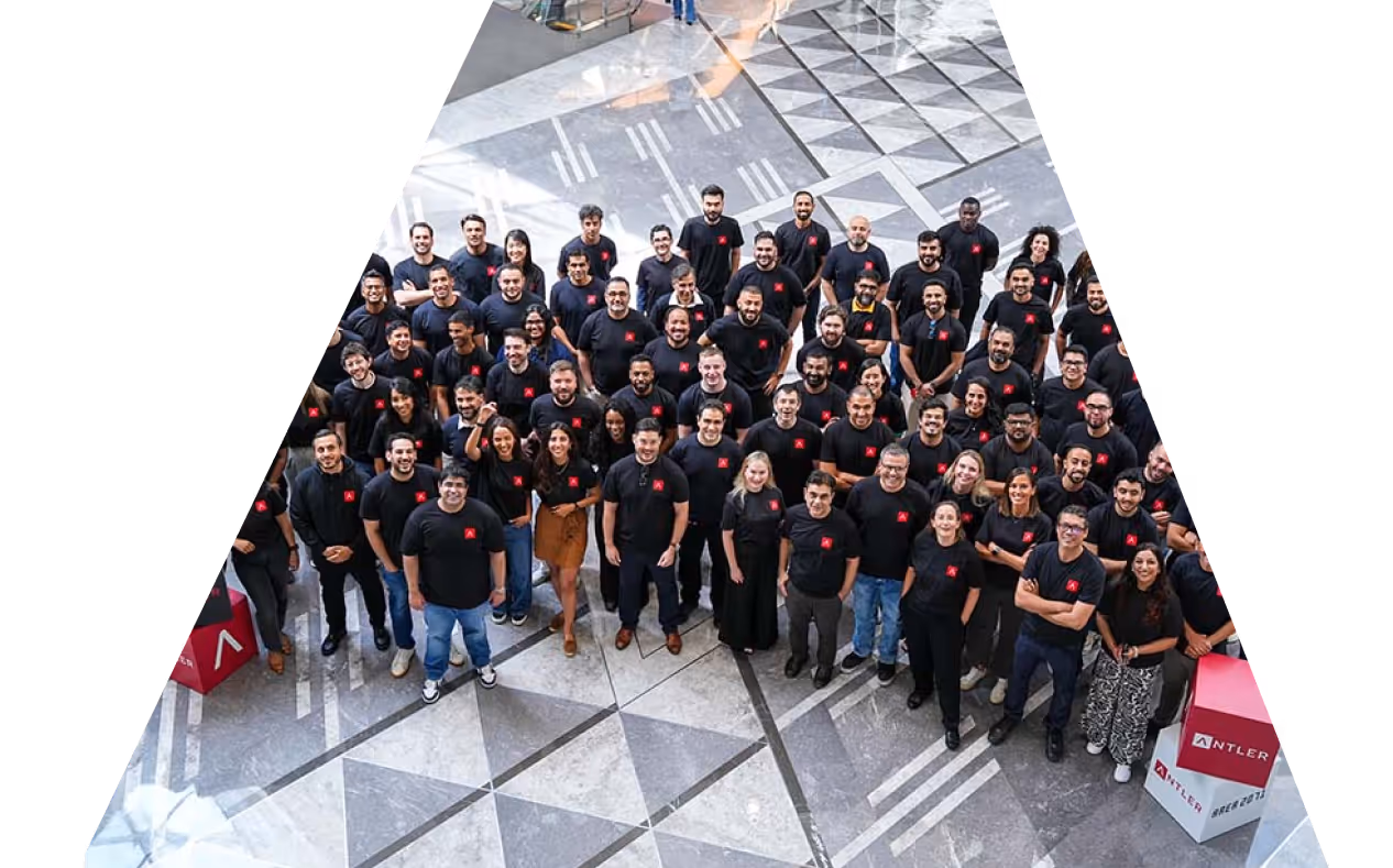 A group of people wearing black shirts with red hearts on them.