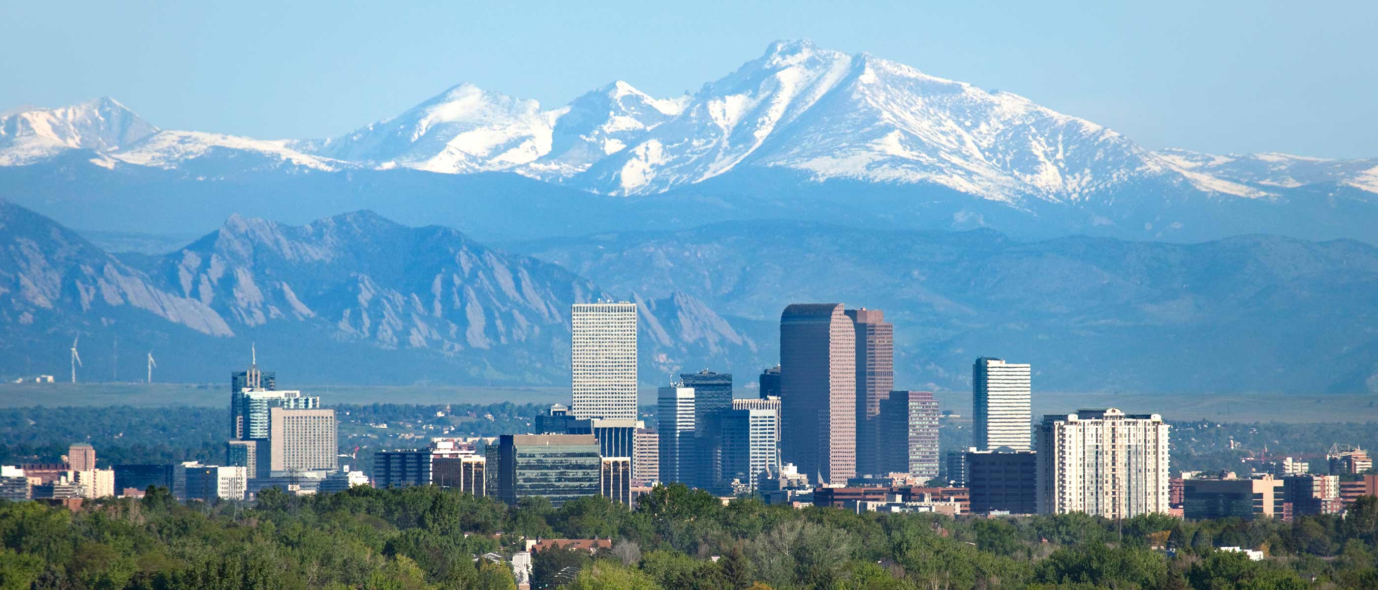 Denver skyline with the Rocky Mountains behind