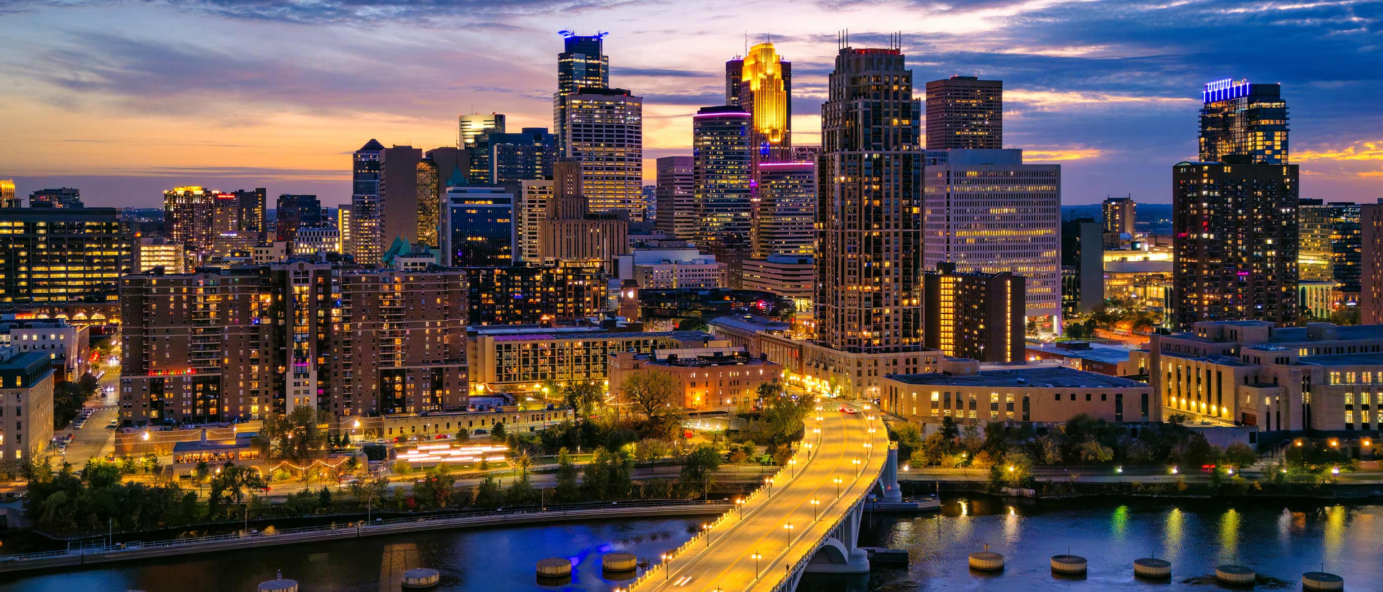 Minneapolis skyline reflecting over the Mississippi