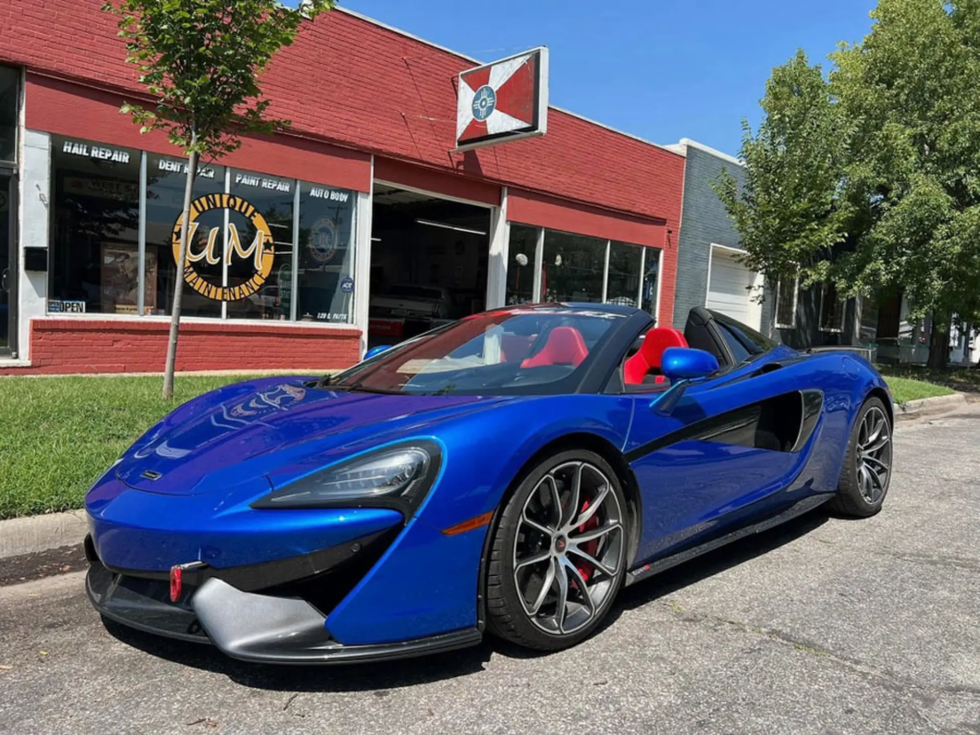 Unique Maintenance professional service team specializing in PDR and auto hail repair in Wichita Kansas