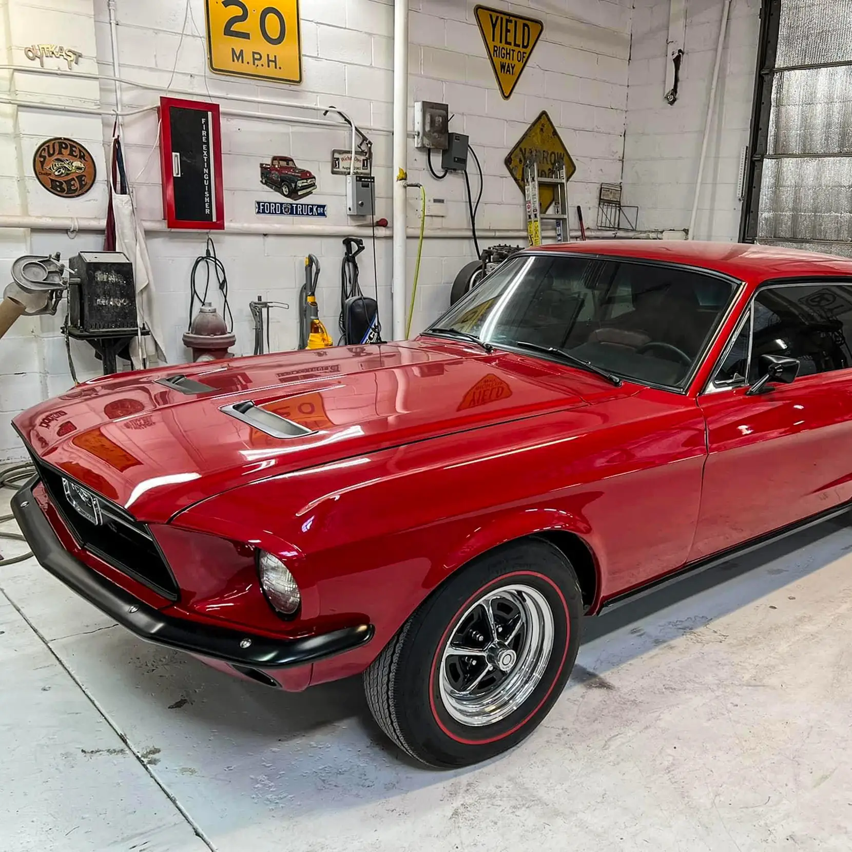 image of a car enthusiast examining a vehicle