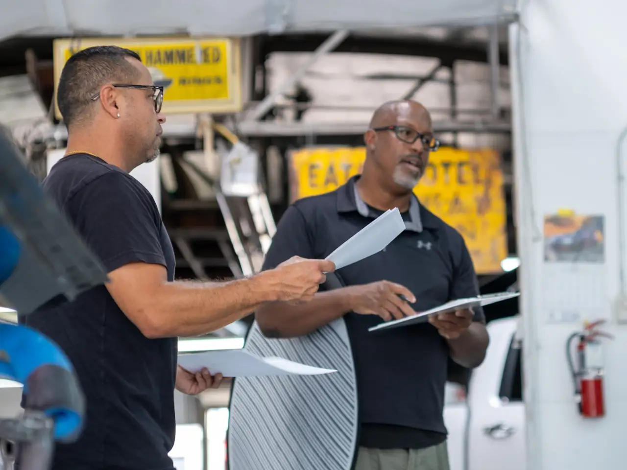 Professional PDR repair process showing specialized dent removal techniques preserving factory paint