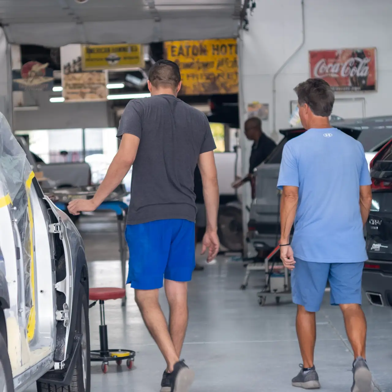 Certified Unique Maintenance PDR technicians with professional equipment at Wichita location