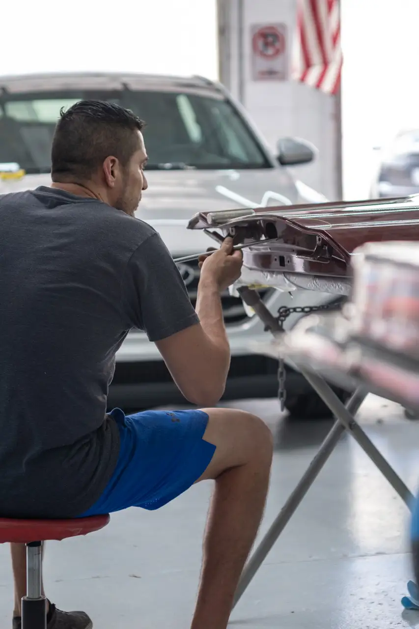 Wichita PDR service center showing professional paintless dent repair equipment and workspace