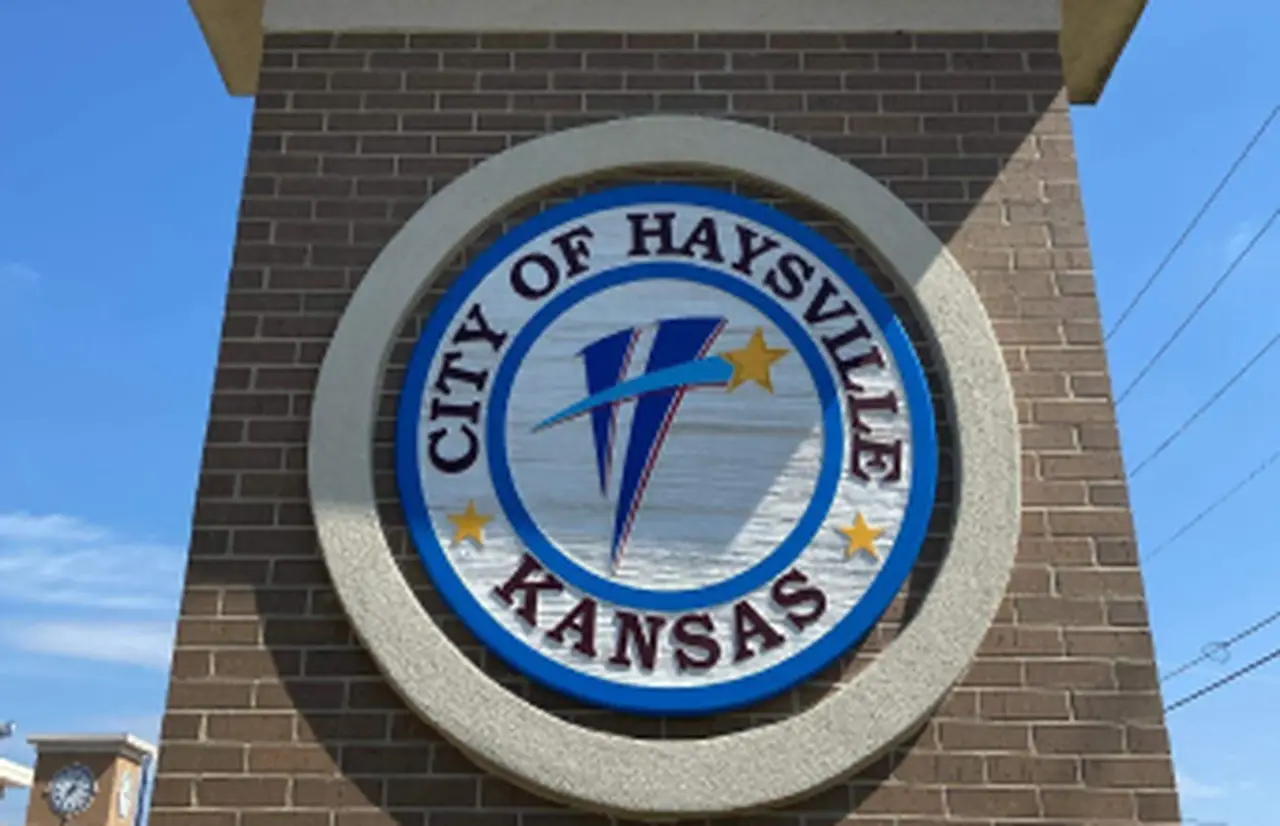 Expert PDR technician using specialized tools for paintless dent repair on vehicle body panel