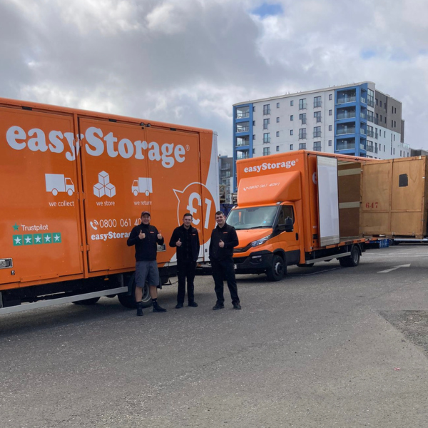 The easyStorage Scottish team and vans in front of student accommodation