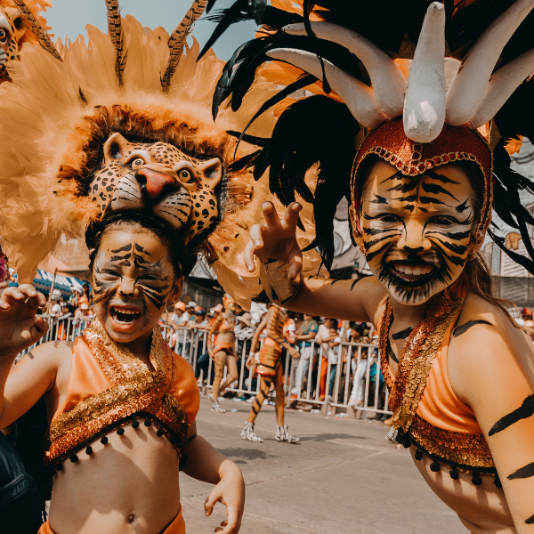 Children dressed as tigers in carnival costumes