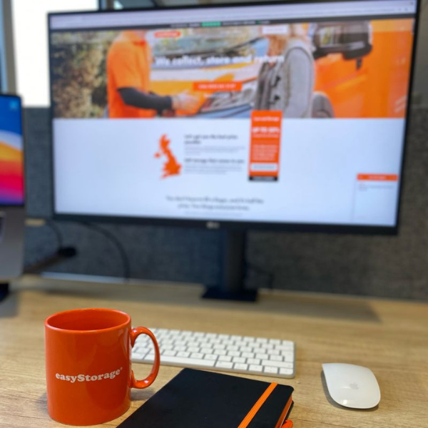 The easyStorage website, mug and notebook