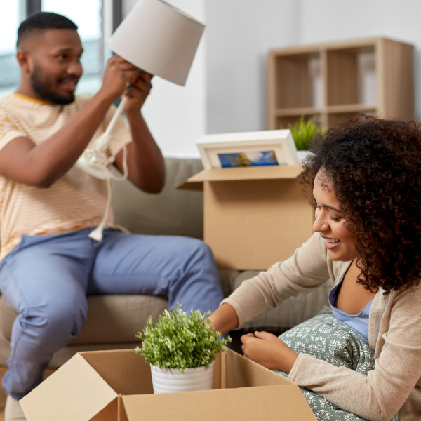 couple moving house packing belongings