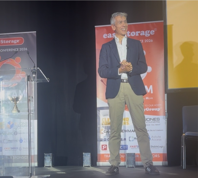 Tony Anderson speaking on stage at easyStorage Conference 2026