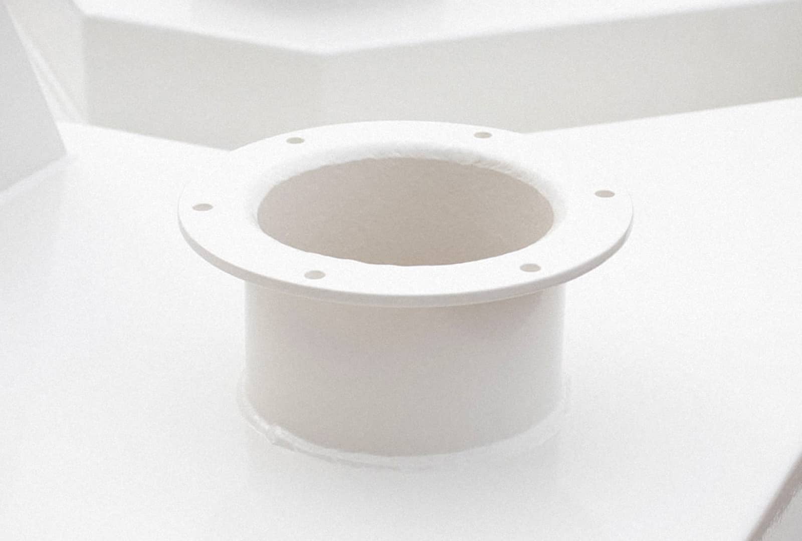 A newly painted bright white metal part extruding from a truck body