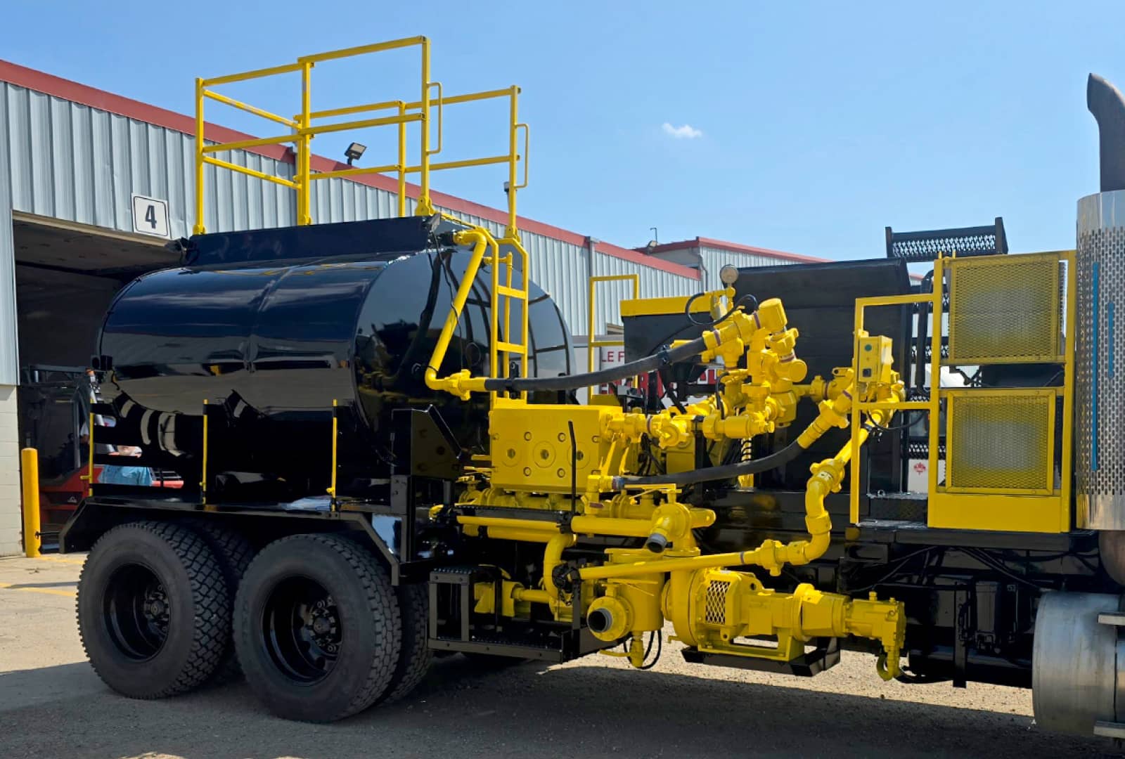 Newly painted black truck with bright yellow accents