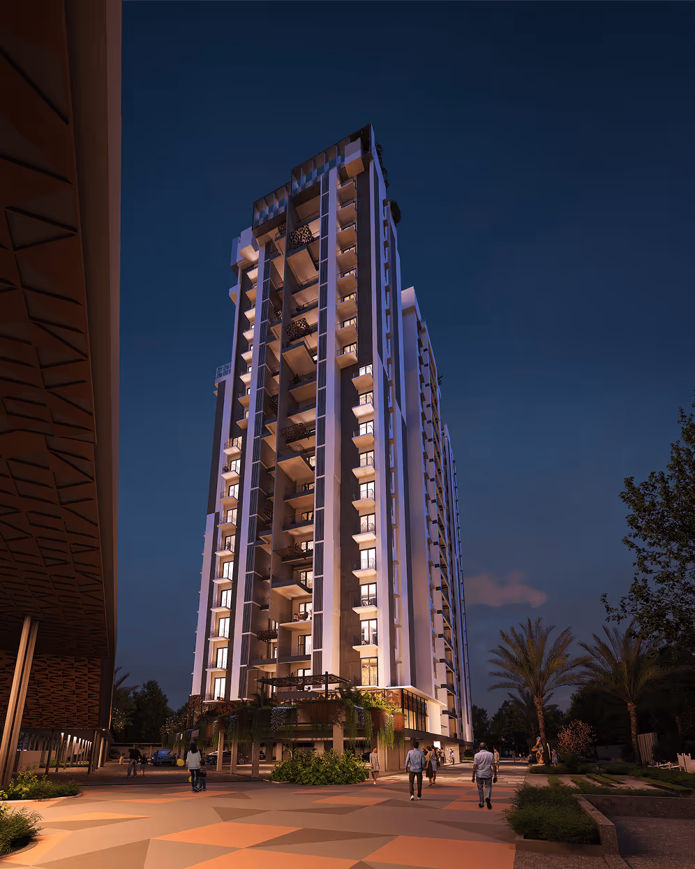 Symphony Heights tower at night view from entry plaza — site visit invitation.
