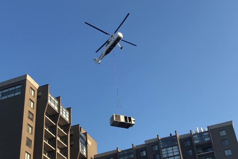 Helicopter flying with an external cargo load suspended below the aircraft
