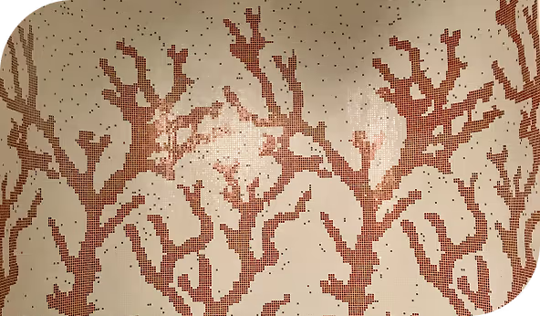Mosaic tile wall with coral pattern design in red and white, suitable for modern shower layouts and ADA-compliant bathroom applications.