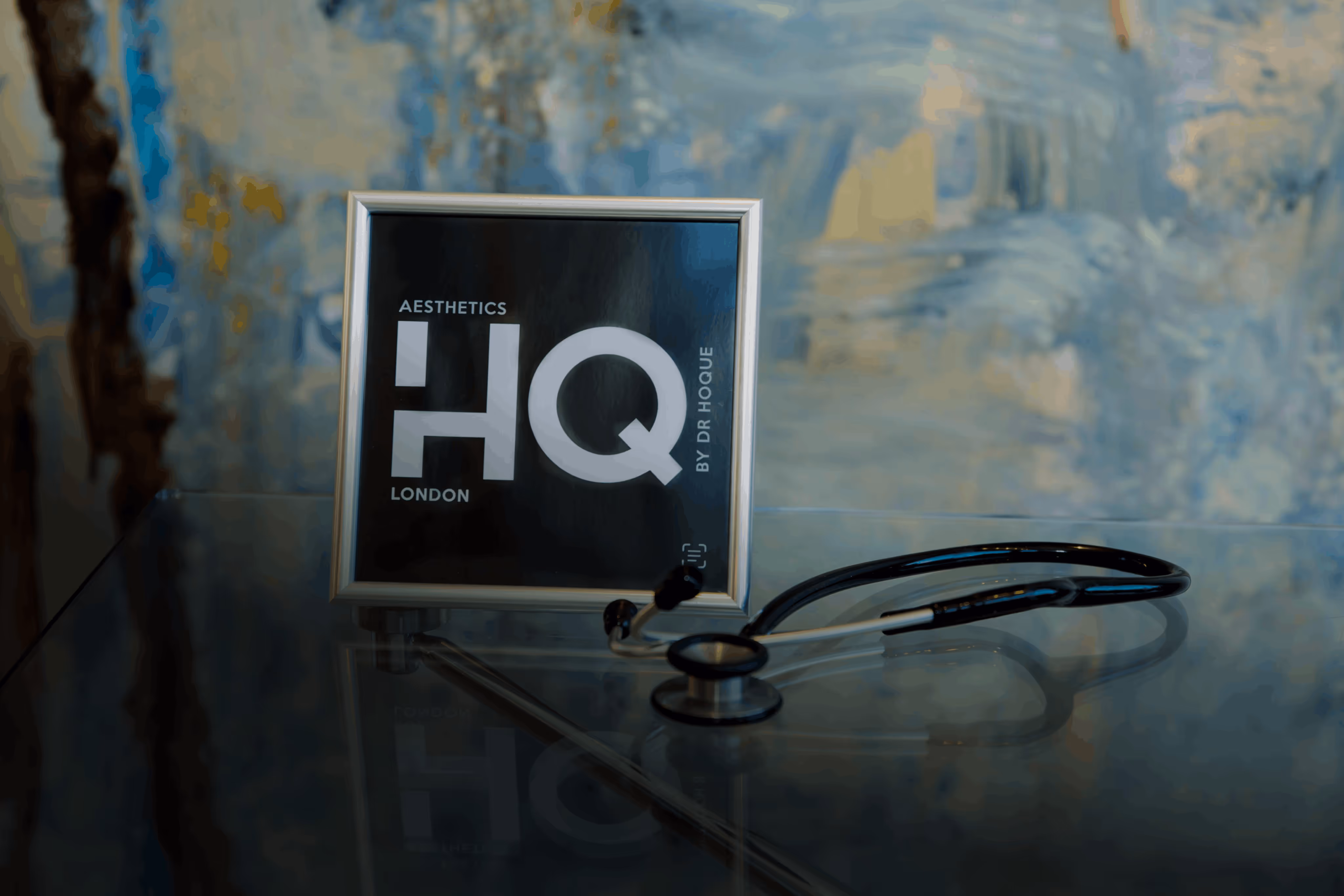 image of aesthetics hq london plaque on a table