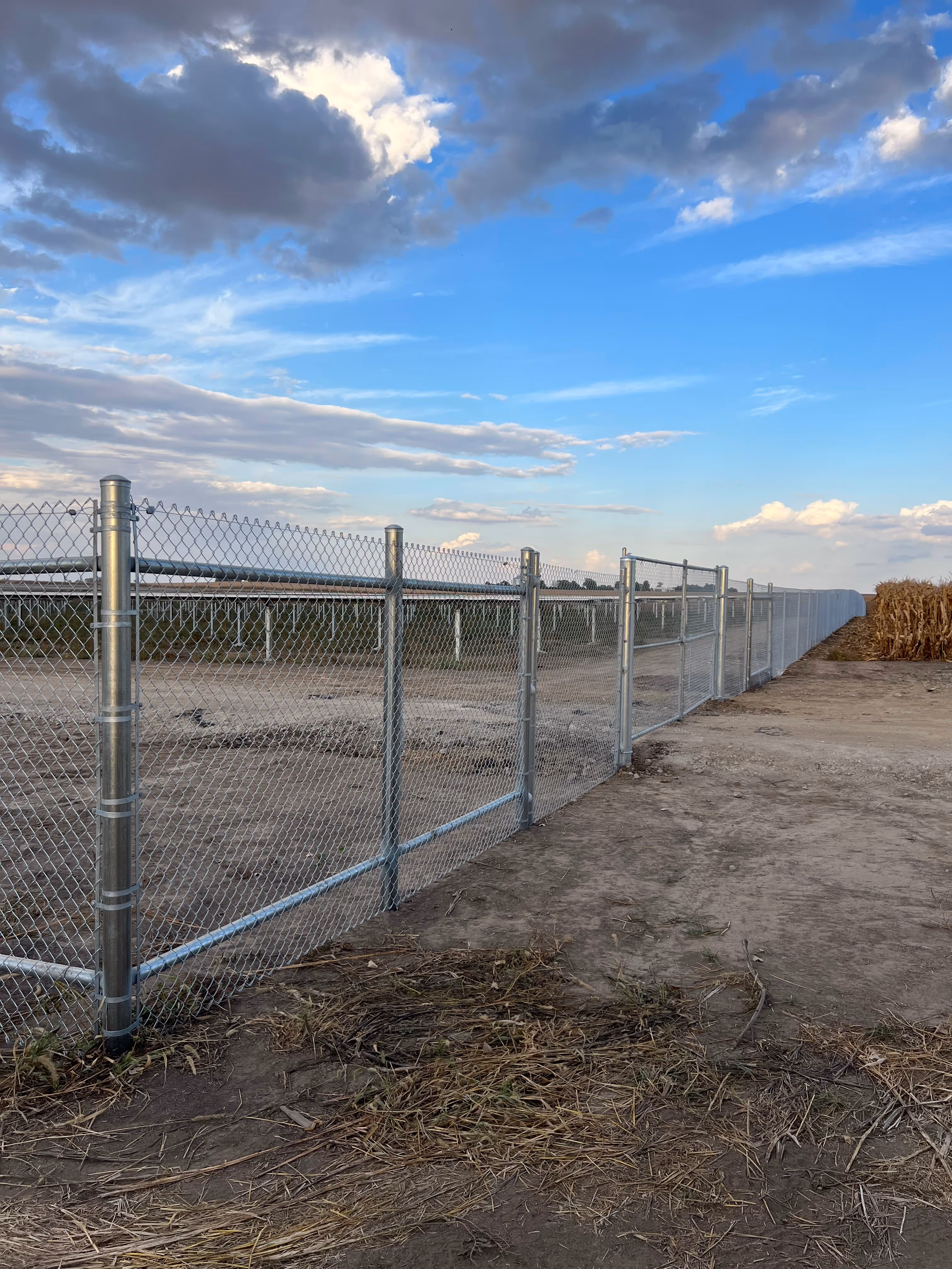 solar field fence installation in michigan