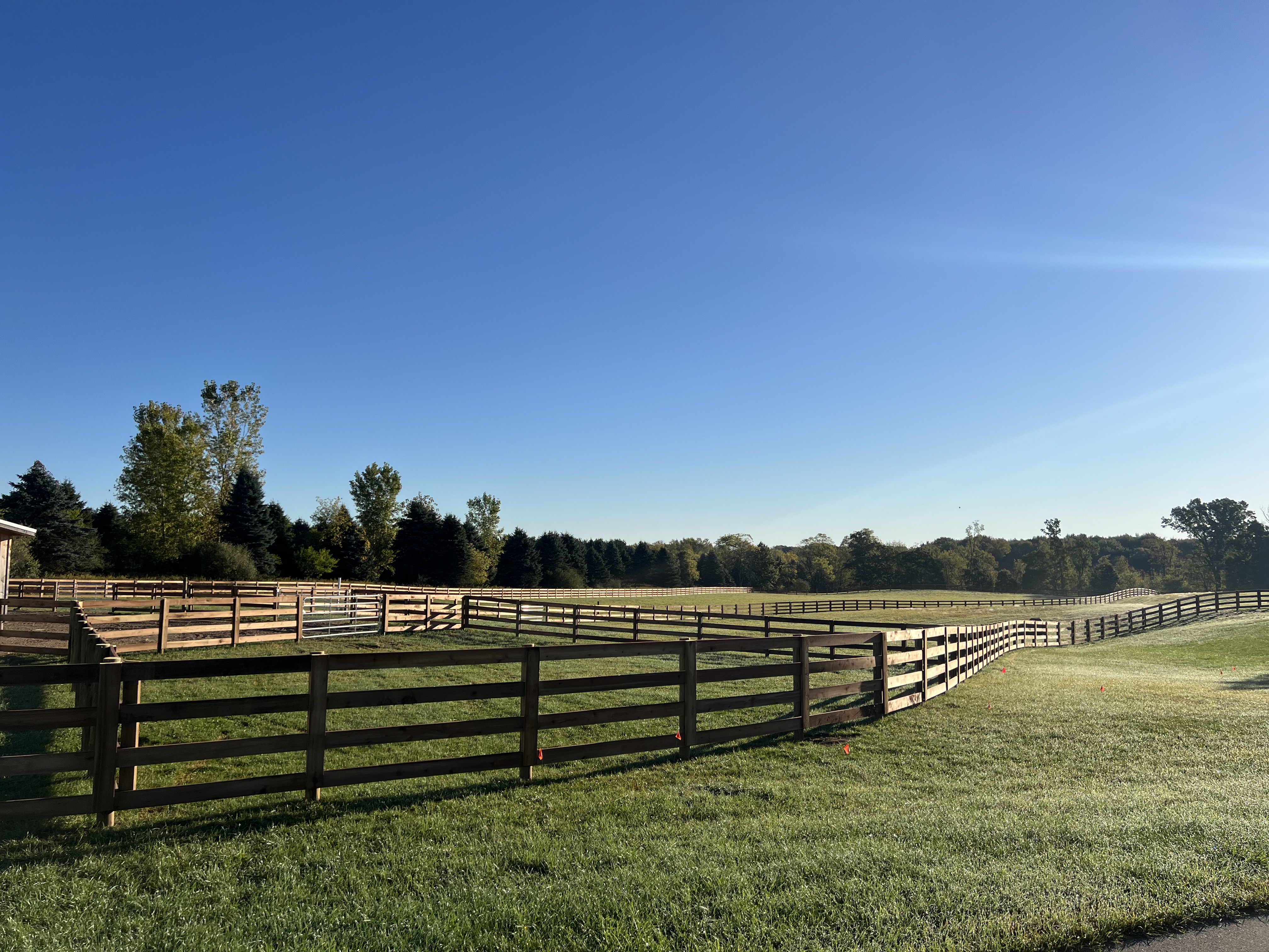 Michigan-tough farm fencing built to work: woven wire, high-tensile (electric or coated), board, and safe gates—installed clean and square for livestock security and long life.